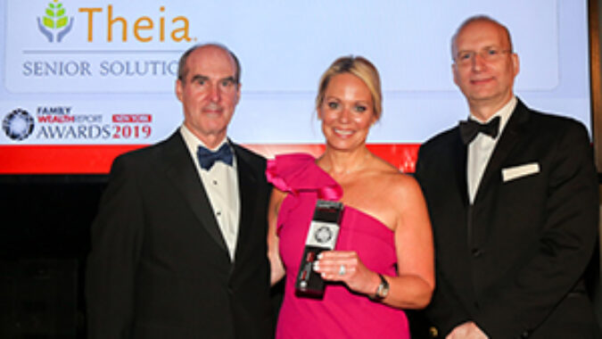 Image of Theia CEO Joanna Gordon Martin accepting award