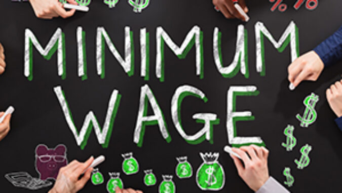 Minimum Wage written on a chalkboard