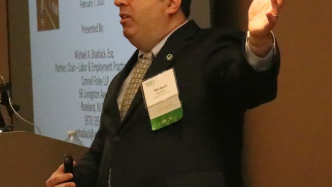 Attorney Michael Shadiack gestures during a presentation on anti-harassment policies in the workplace